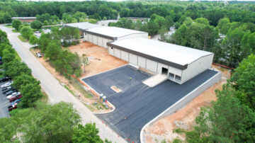 Two buildings, plus loading access & demo field